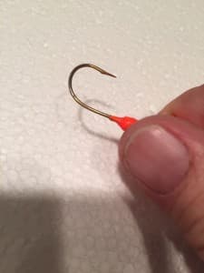 Hook with flattened barb