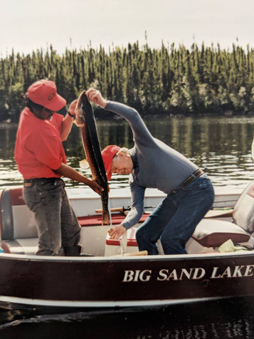 president carter catches fish in canada
